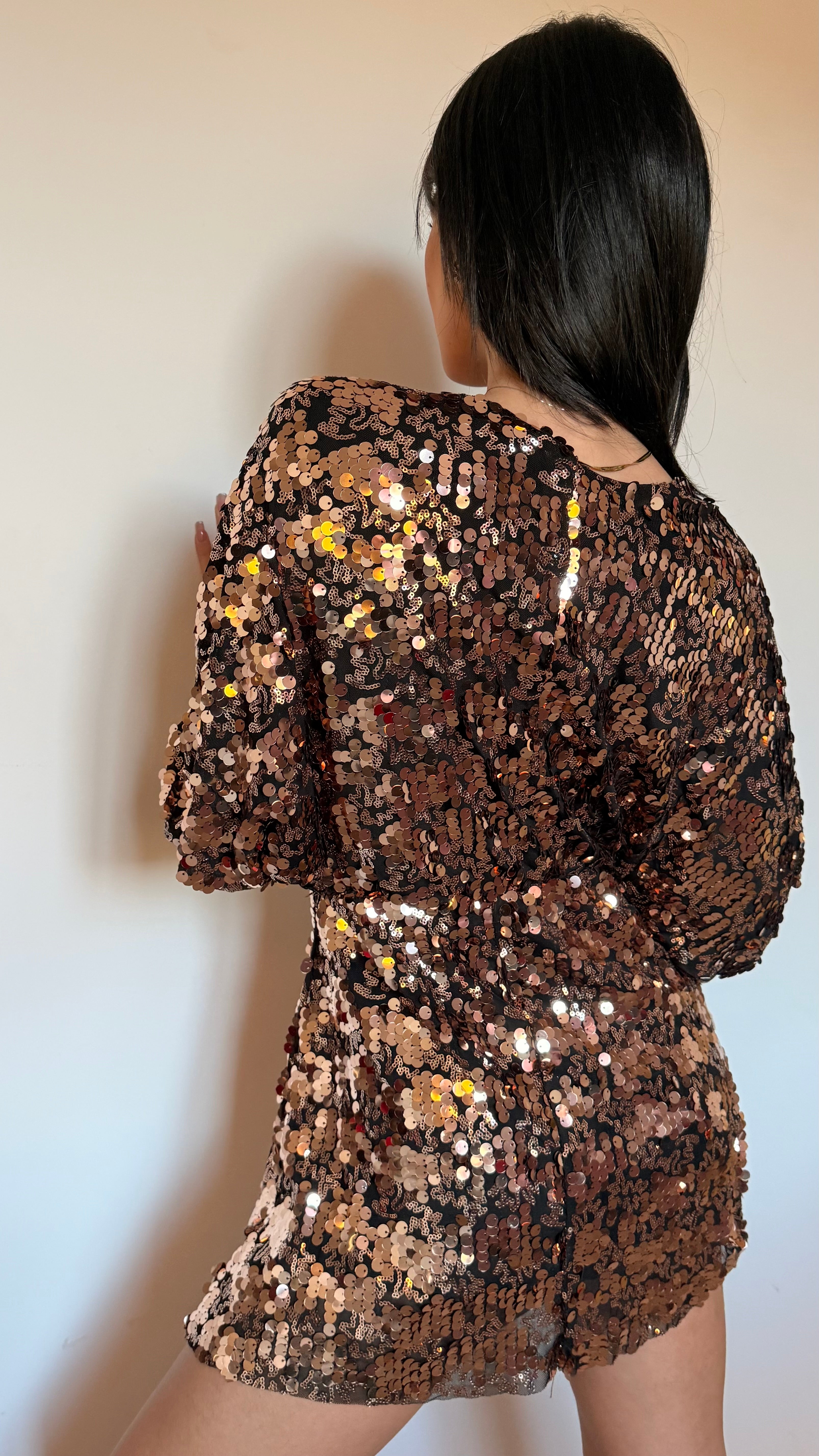 Tuta paillettes oro